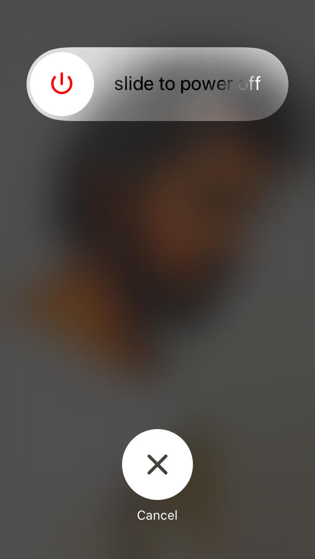 Drag the slide to power off to the right to power off iPhone